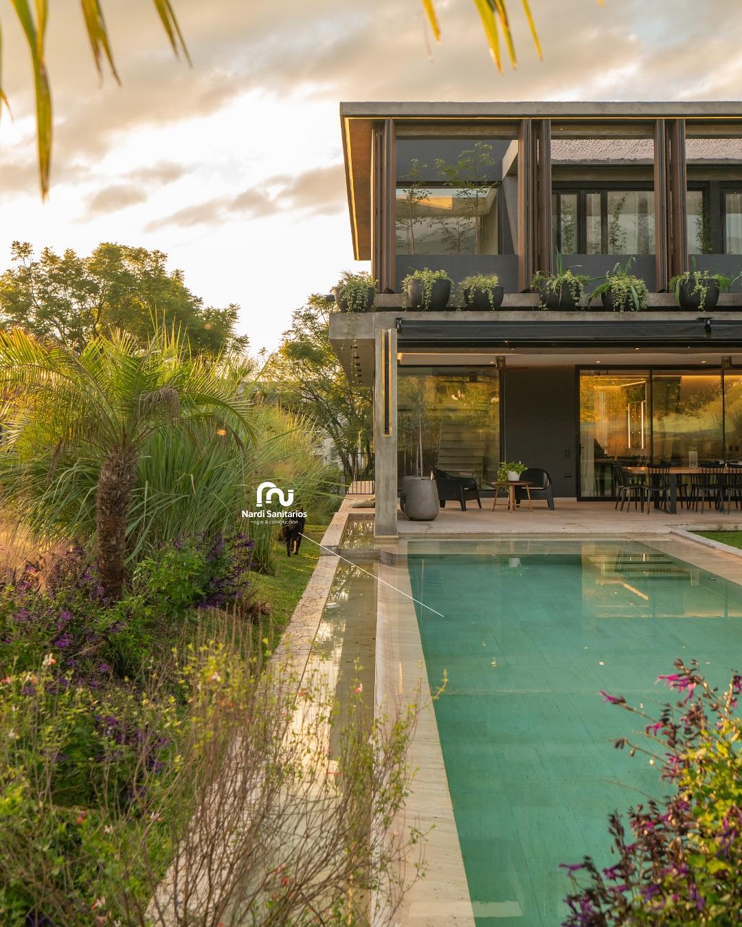 Galería y piscina de Casa GBA